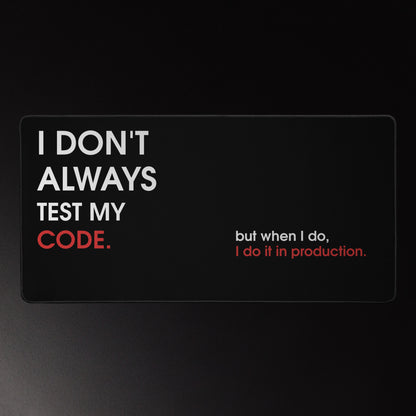Funny developer desk mat on black with white and red typography reading I Don't Always Test My Code I Do It in Production