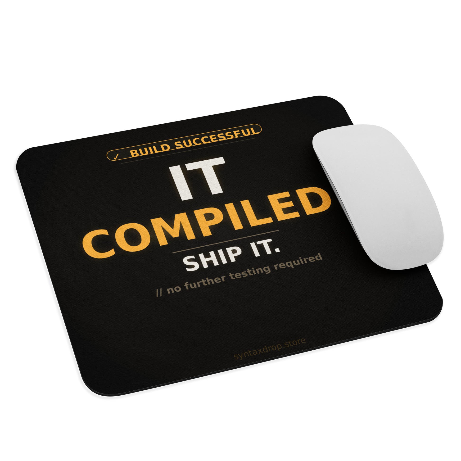 Funny developer mouse pad on near-black background with amber and white Build Successful Ship It typographic design 