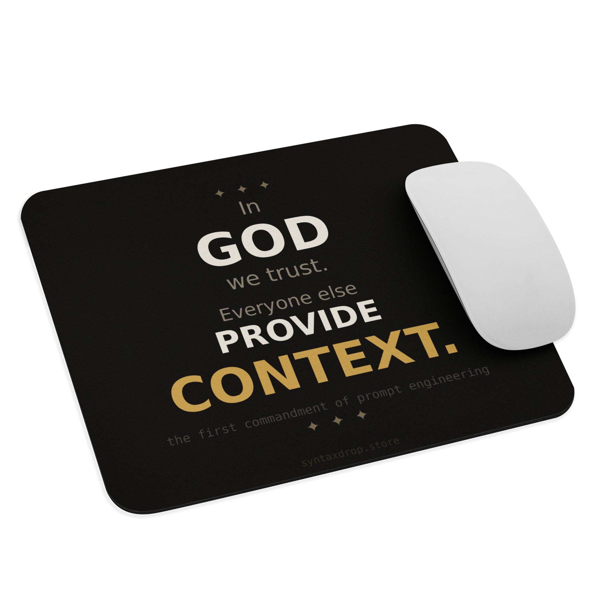 Prompt engineer mouse pad on cream background with bold black and gold typography reading In God We Trust Everyone Else Provide Context