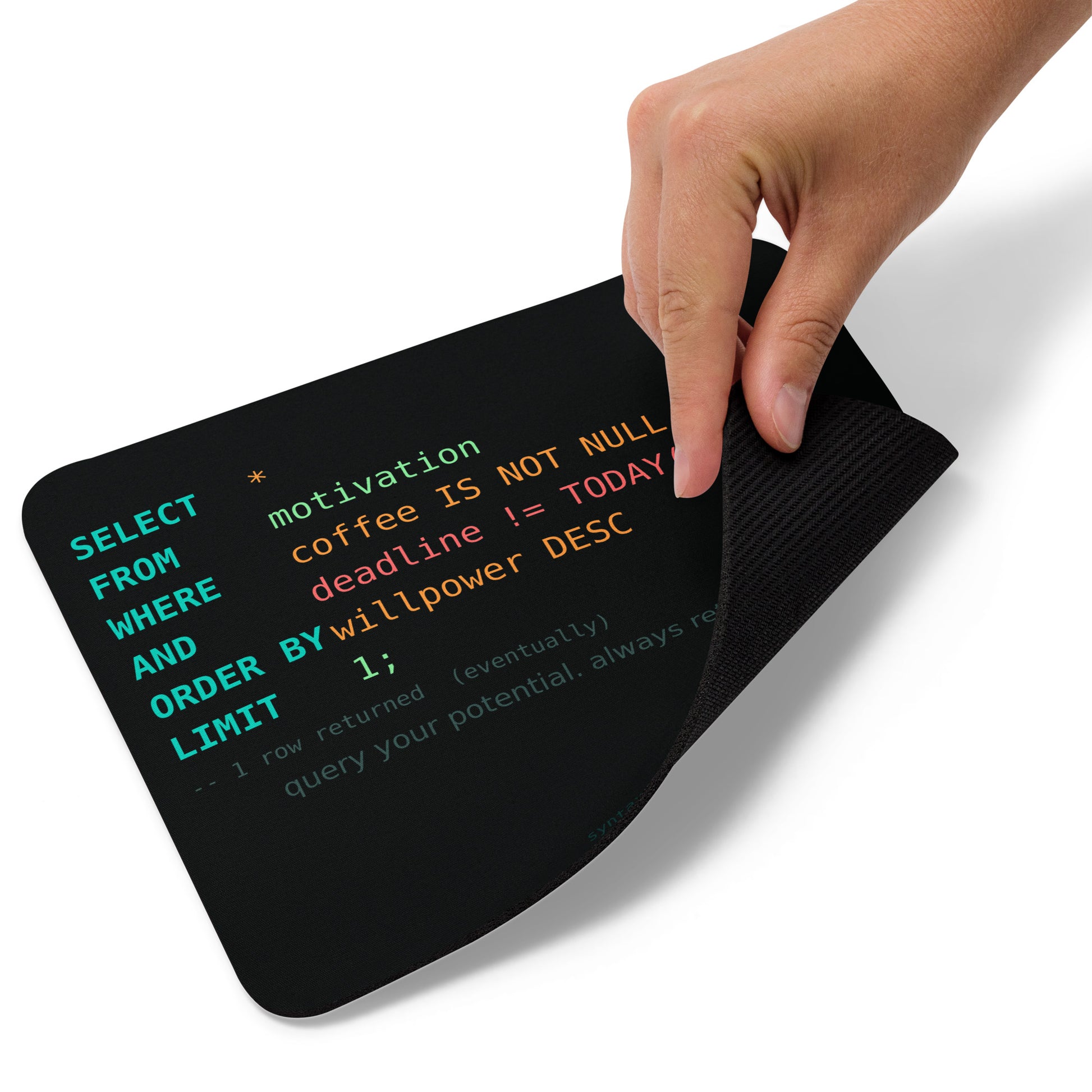 SQL query motivational mouse pad with syntax-highlighted SELECT statement on dark terminal background for database developers