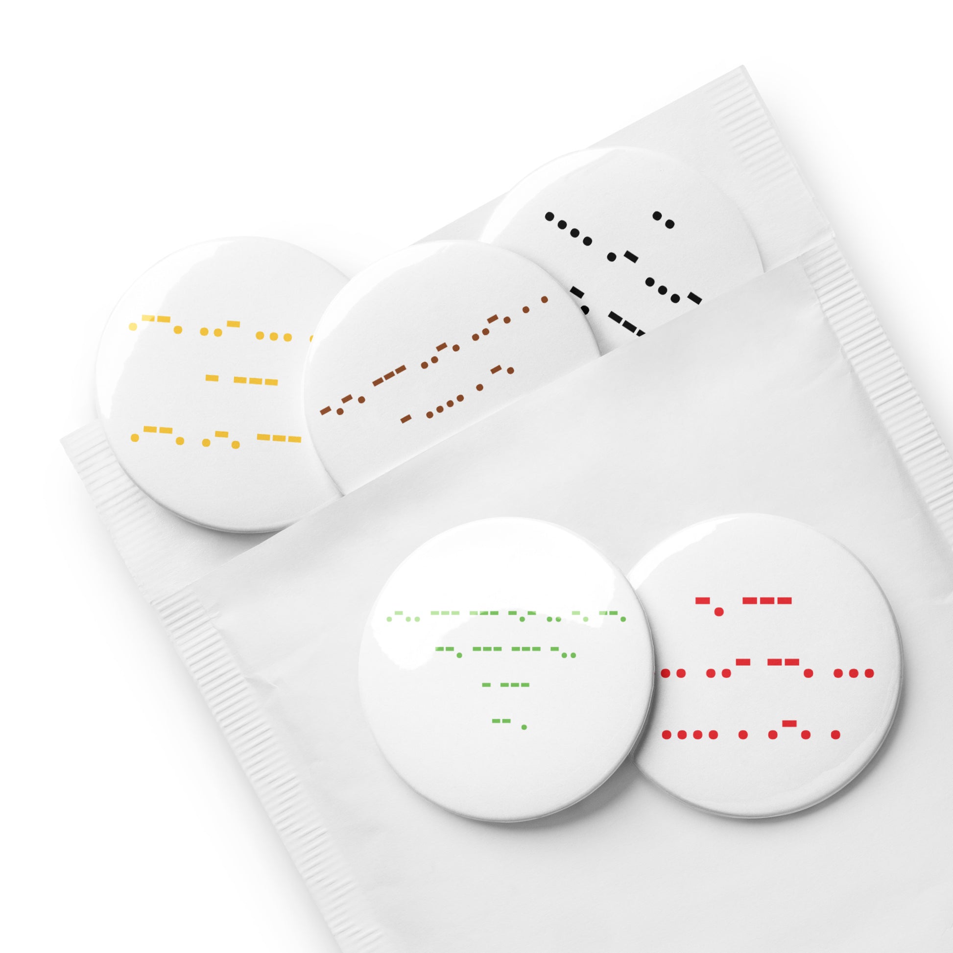 Developer pin badge set of five round white glossy pins with coloured morse code messages in yellow, brown, black, green and red
